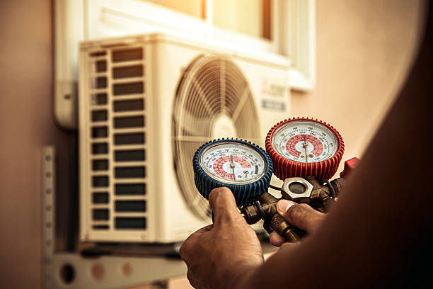 Professional Heat Pump Repair technician working in Somers, WI